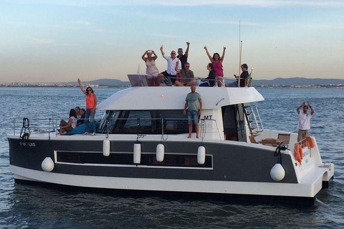 1H power catamaran up to 18 people in Lisbon - Christ the King across the river