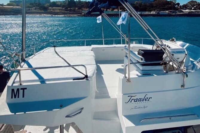 2H Lisbon Private Luxury Catamaran Tour with Welcome Drink - Close views of Lisbon’s riverfront architecture