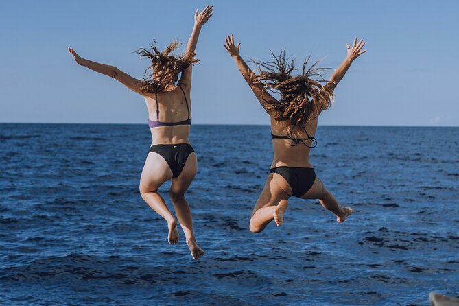 4-in-1 • Gili Islands Snorkel & Sunset Half-day Catamaran Cruise - Dinner as the sun goes down