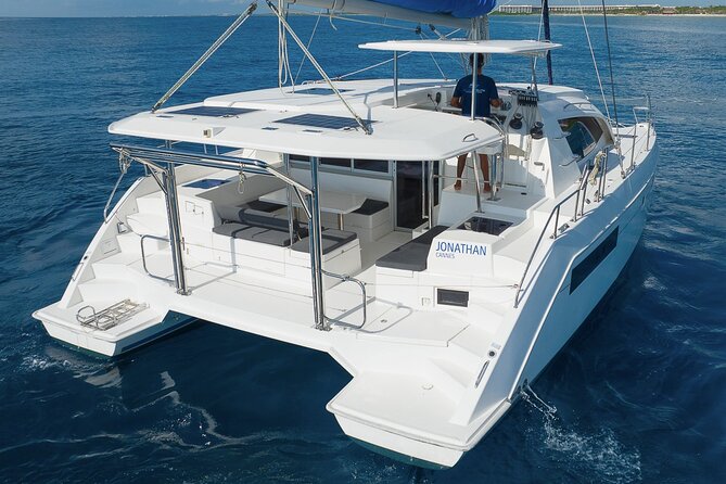 4H Lux 40' Catamaran All-Inclusive in Tulum and Playa del Carmen. - The crew, music, and private-group advantage