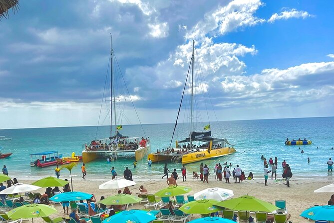 7 Mile Beach Party Catamaran Cruise with Snorkeling & Ricks Cafe - Key points to know before booking