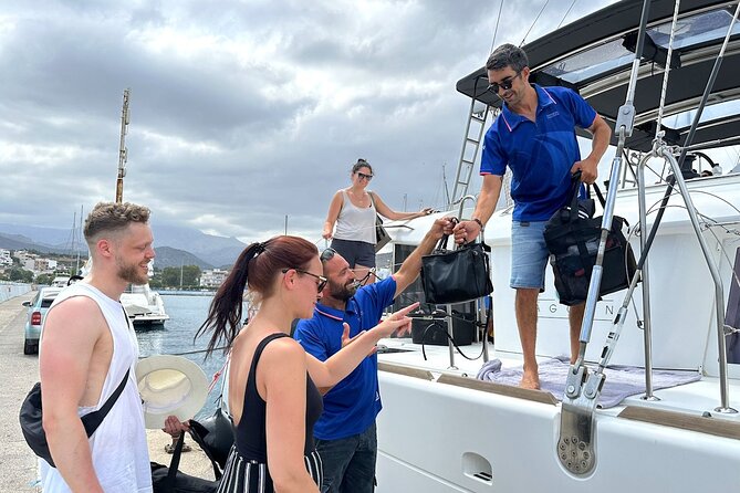 Ag. Nikolaos: Catamaran Trip with Sushi, Drinks, & Water Toys - Cruising out of Agios Nikolaos into Mirabello Gulf