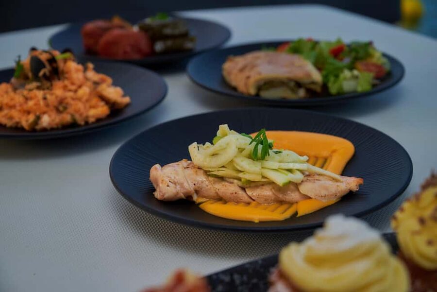 Agios Nikolaos All-inclusive Catamaran Cruise & Water Toys - A Cretan lunch that is more than an afterthought