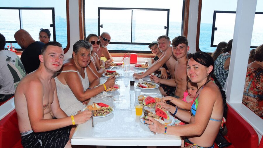 Alanya White Pearl Catamaran Cruise – Scenic Views & Swim - The boat, music, and onboard comfort