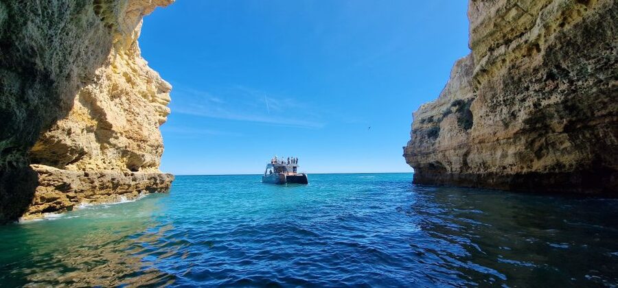Albufeira: Coastline and Benagil Caves Tour by Catamaran - Reaching Benagil Cathedral Cave
