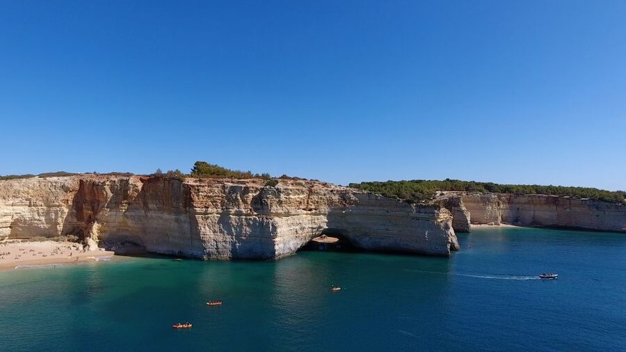 Albufeira: Coastline and Benagil Caves Tour by Catamaran - Comfort, guides, and onboard atmosphere