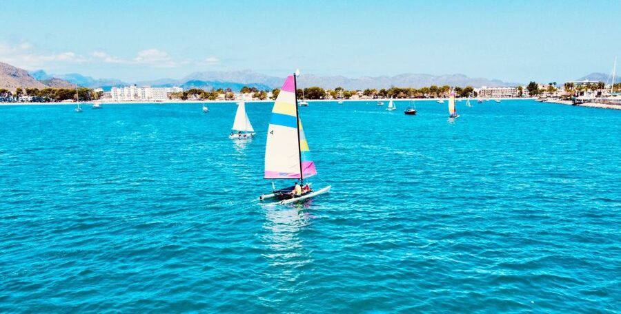 Alcudia: 1-Hour Catamaran Experience with Monitor for 2 - Meeting Wind Pirates at Port dAlcúdia