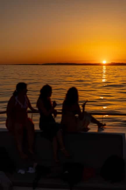 Algarve: Catamaran Sunset Tour with DJ or Live Guitarist - A swim stop before the evening cools
