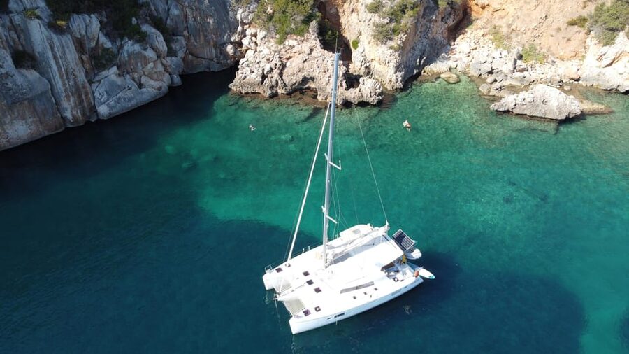 Alghero catamaran sunset tour Alghero - La Maddalenetta Island and the last swim of the day
