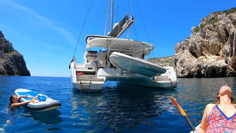 Alghero: Scenic Catamaran Cruise with Lunch and Snorkeling - Sailing through Porto Conte and Capocaccia Park