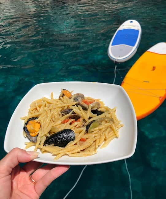 Alghero: Scenic Catamaran Cruise with Lunch and Snorkeling - Lunch made by the skipper