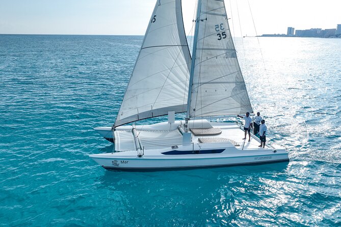All-Inclusive Isla Mujeres Catamaran with Free Transportation - What the $119 price really covers