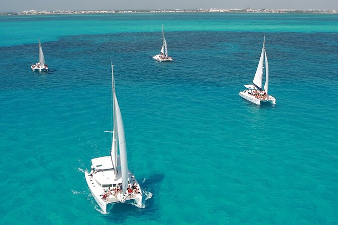 All-Inclusive Isla Mujeres Catamaran with Free Transportation - Boarding the Oceanix catamaran