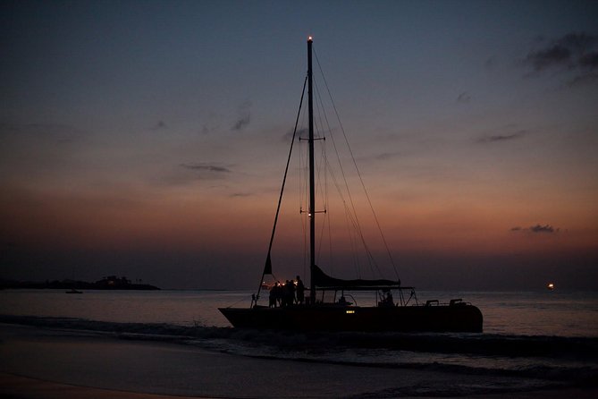 Antigua Sunset Catamaran Cruise From St. John's - Drinks, music, and the social mood onboard