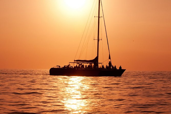 Antigua Sunset Catamaran Cruise From St. John's - The first hour: coastline views and island stories