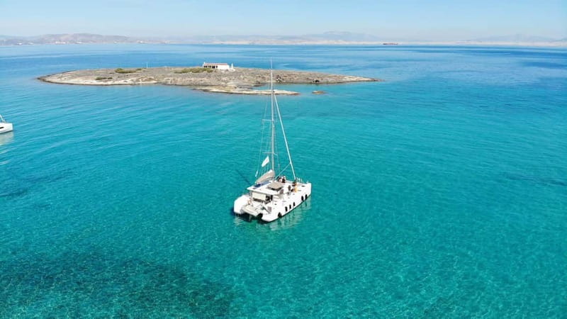 Athens: Half-Day Morning Catamaran Cruise with Meal & Drinks - The swimming stops and snorkeling time