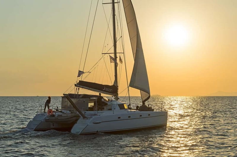 Athens: Half-Day Sunset Catamaran Cruise with Meal & Drinks - Anchoring for a swim and snorkel