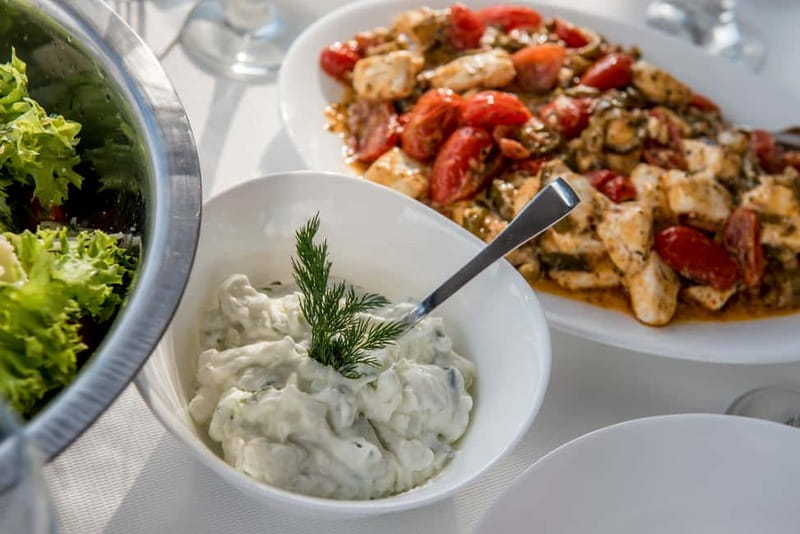 Athens: Half-Day Sunset Catamaran Cruise with Meal & Drinks - A Greek meal from the small galley