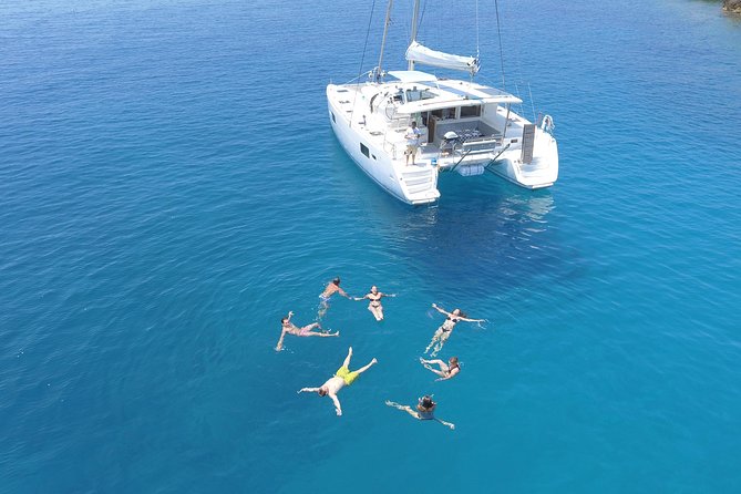 Athens Private Luxury Catamaran Cruise with Traditional Greek Meal and BBQ - Drinks, service, and the meaning of luxury
