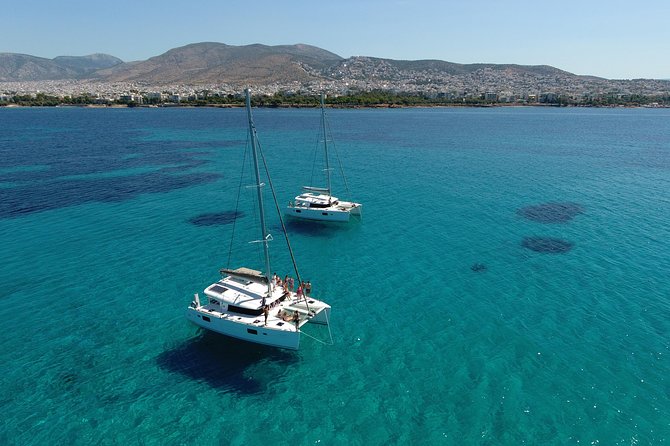 Athens Private Luxury Catamaran Cruise with Traditional Greek Meal and BBQ - The first swim stop and the value of the towels