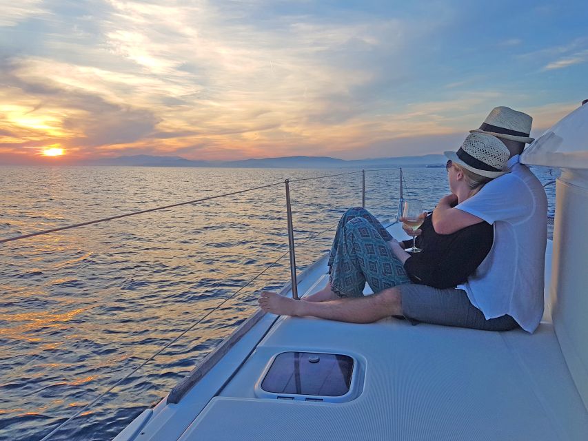Athens: Riviera Catamaran Cruise with Meal and Drinks - Vouliagmeni, swimming, and lunch onboard