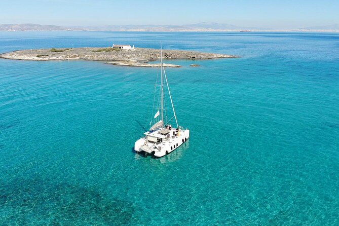 Athens Semi private Morning Catamaran cruise with meal & drinks - First swim stop: Megalo Kavouri and Hydroussa