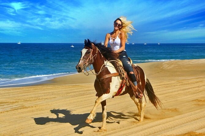 ATV, Zipline, Horseback, Bamboo Rafting & Catamaran Boat Jamaica - Catamaran music, dancing, and optional snorkeling