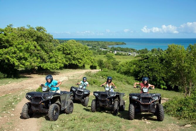 ATV, Zipline, Horseback, Bamboo Rafting & Catamaran Boat Jamaica - Bamboo rafting on a quieter tropical river
