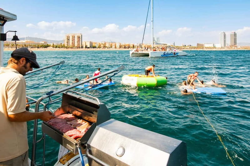 Barcelona: Catamaran Party Cruise with BBQ Meal - Port Olímpic start and the meeting point that matters