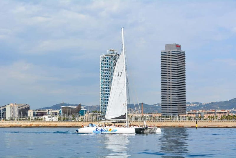 Barcelona: Catamaran Party Cruise with BBQ Meal - The return cruise, music, and dancing