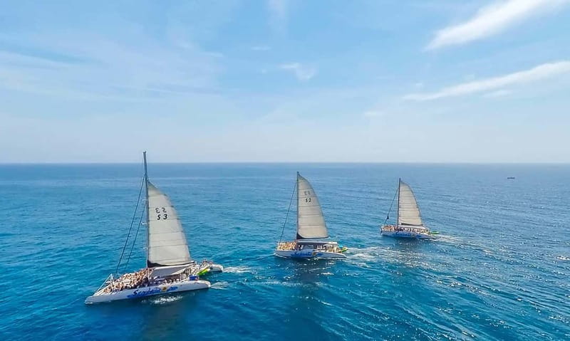 Barcelona: Catamaran Party Cruise with BBQ Meal - The first hour, Barcelona from the water