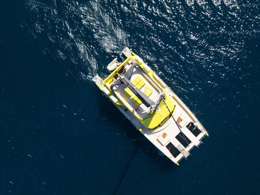 Barcelona: Daytime or Sunset Catamaran Cruise with Music - Music, drinks, and the onboard mood