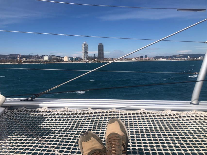 Barcelona: Shared cruise on a catamaran Drink+Local Tapa - The quieter details above Barcelona