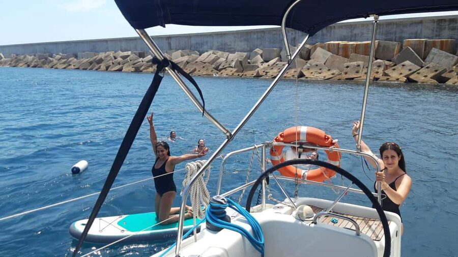 Barcelona: Shared cruise on a catamaran Drink+Local Tapa - A drink, local tapa, and a relaxed onboard mood