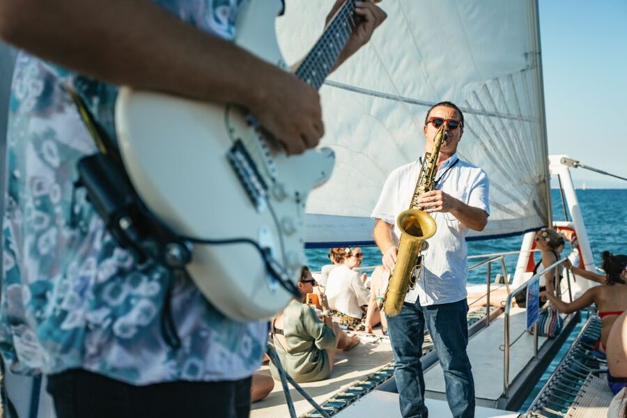 Barcelona: Sunset Catamaran Cruise with Live Music - Setting sail from Barcelona’s coast