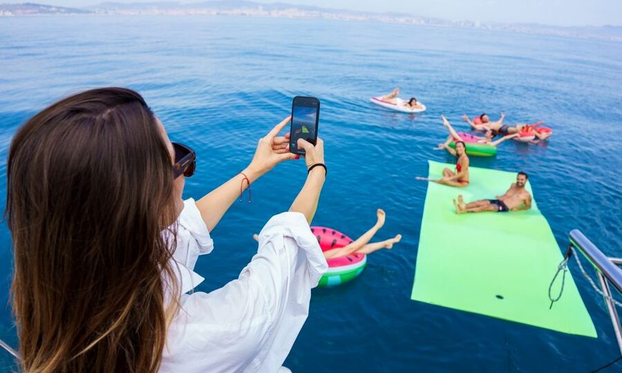 Barcelona: Sunset or Day Catamaran Cruise with Tapa & Drink - Choosing the daytime sailing and 30-minute swim