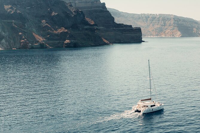 Beautiful Day Catamaran Caldera Cruise incl. Meal & Drinks - Mesa Pigadia and White Beach, the longest stop