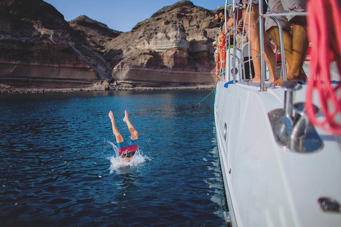 Beautiful Day Catamaran Caldera Cruise incl. Meal & Drinks - Indian Rock, the lighthouse, and the photo run