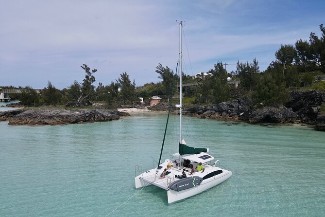 Bermuda Private Catamaran:Snorkeling, Shipwrecks & Cliff Jumping - Paddleboarding and swimming in clear water