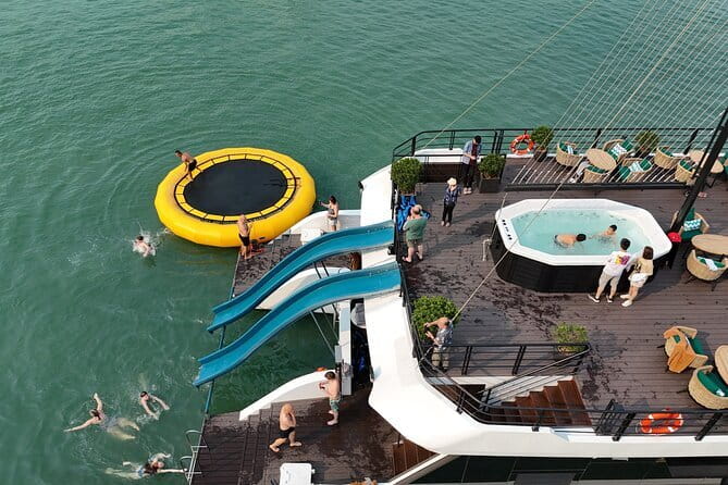 Best Selling Catamaran Cruise Premium Day Trip Explore Halong Bay - Swimming, water slides, trampoline, and jacuzzi