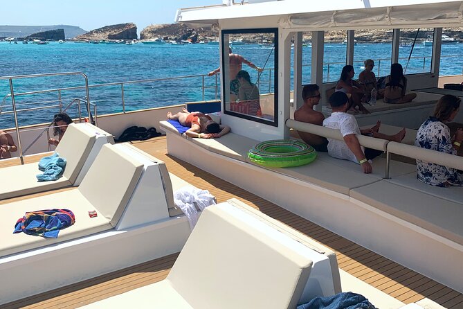 Blue Lagoon Evening Catamaran Cruise - Sunset sailing back to Bugibba