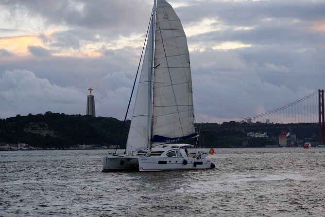 Boat Rental on a Luxurious Catamaran in Lisbon - Under the 25 de Abril Bridge