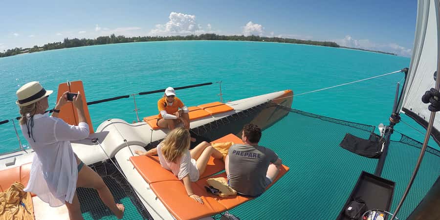 Bora Bora: Sunset Catamaran Cruise with Snacks and Drinks - A small catamaran with room to relax