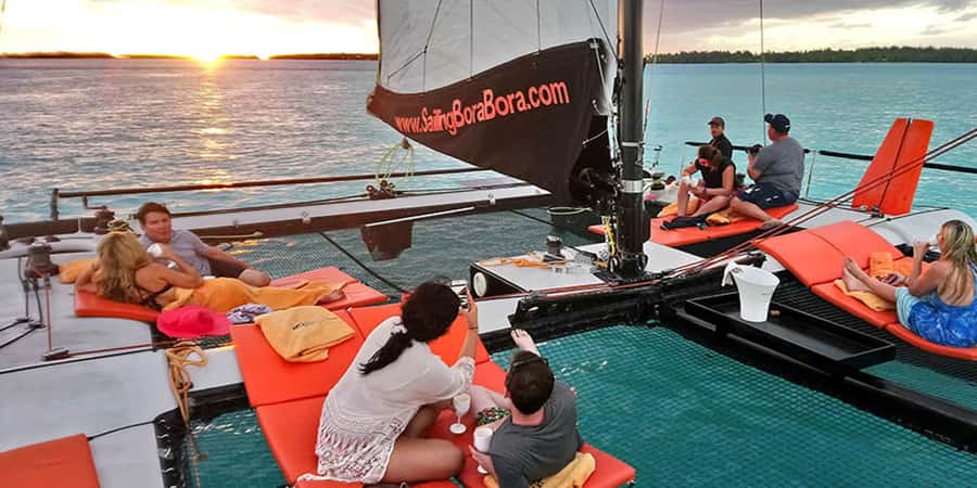 Bora Bora: Sunset Catamaran Cruise with Snacks and Drinks - Speedboat pickup makes the evening easy