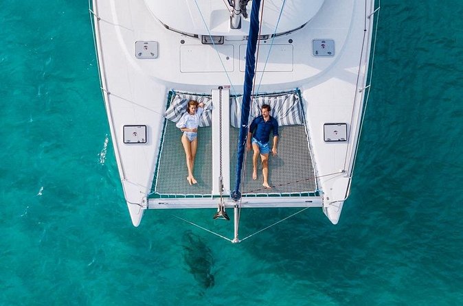 Cala Mondrago Private Sunset Cruise on Catamaran - Snorkeling, SUP, and when to use them