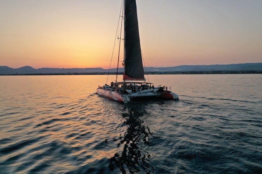Cambrils: Sunset Catamaran Cruise & Drinks w/ Sunbed - The Balinese sunbed and deck setup