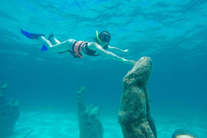 Cancun Half-Day Sailing Catamaran Cruise to Isla Mujeres - What happens at El Meco Reef