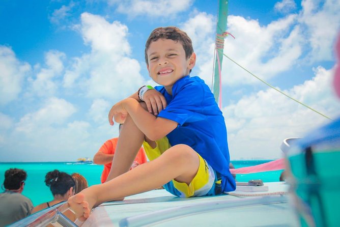 Cancun Half-Day Sailing Catamaran Cruise to Isla Mujeres - Snacks, drinks, and the social side of the boat