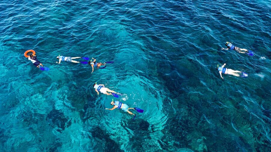 Cancun: Isla Mujeres Catamaran Ride, Open Bar & Buffet Lunch - Snorkeling at the coral reef