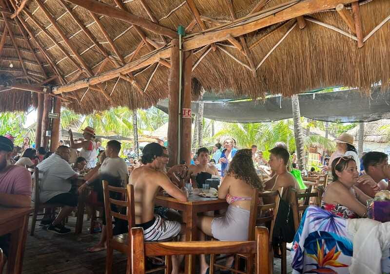 Cancun: Isla Mujeres Catamaran with buffet, drinks & snorkel - Lunch at Playa Norte Beach Club